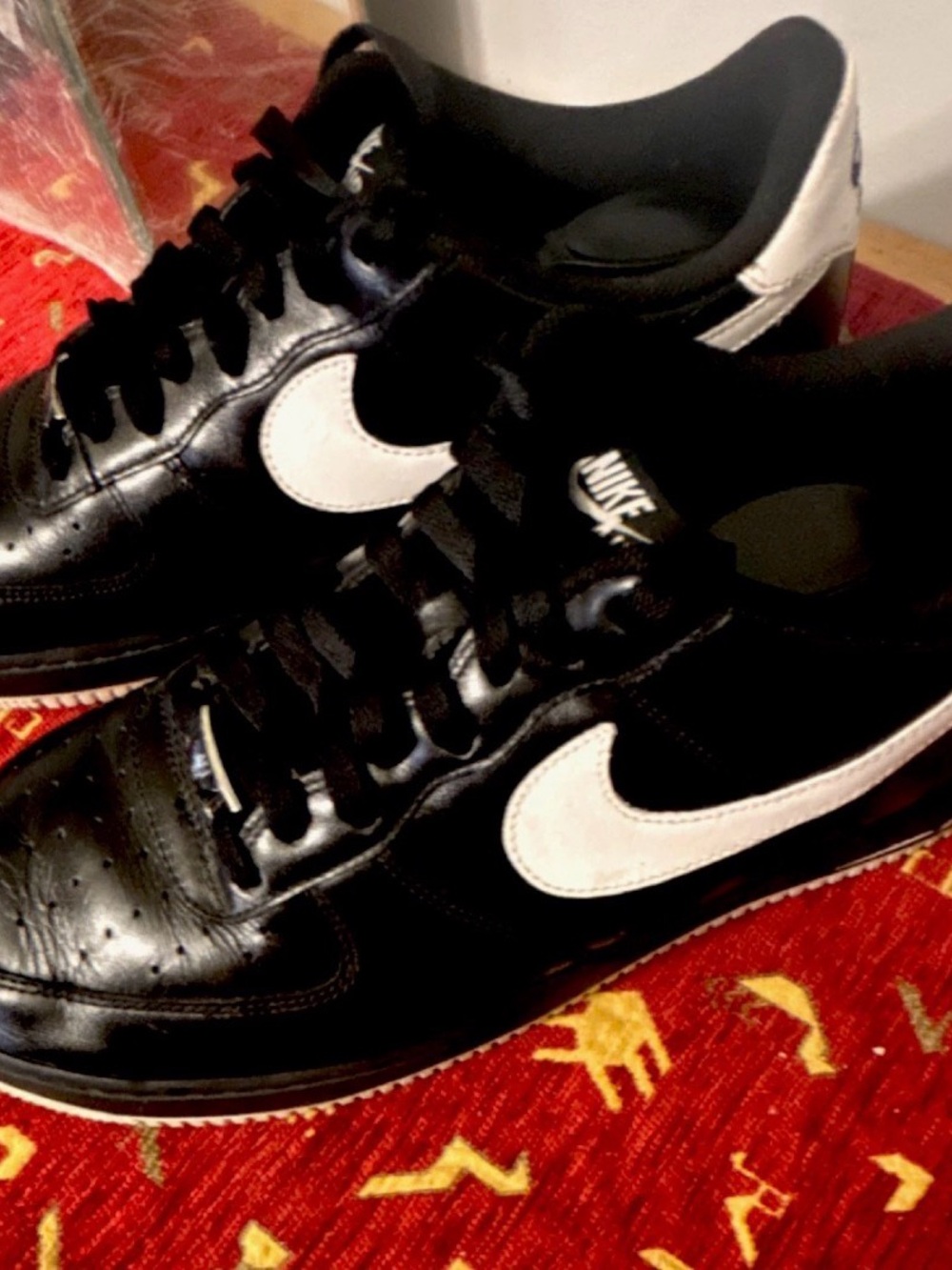 Nike Men’s Black Sneakers with White Swoosh